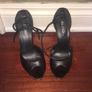 Sexy Aldo peep toe black and brown leather pumps.